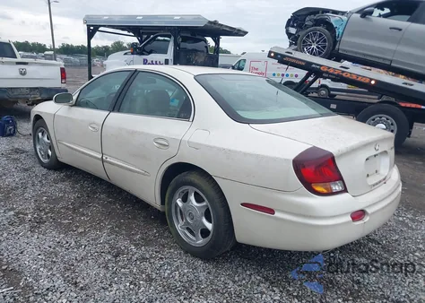 2002 Oldsmobile Aurora 4.0 из США, поврежденный, VIN 1G3GS64C024132008